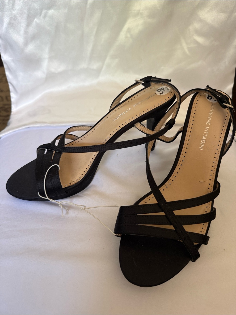 Adrienne Vittadini strappy black heels.